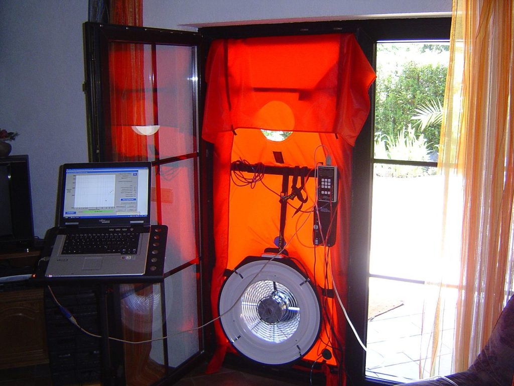 BPI technician performing blower door test