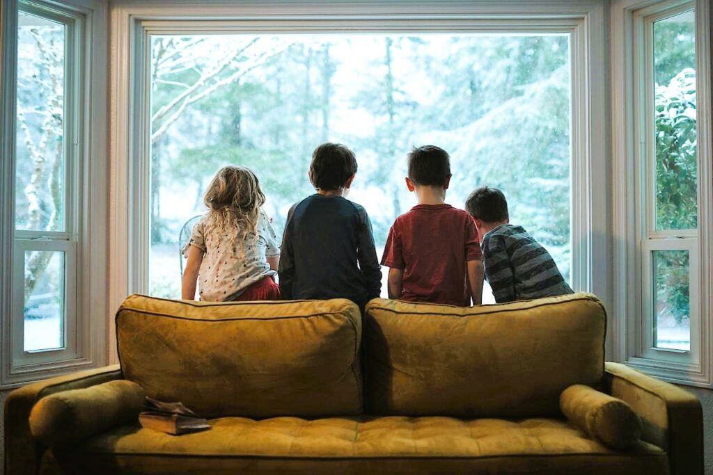 Family enjoying natural light through new Destiny triple-pane windows