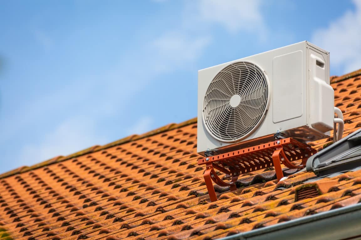 Dual inverter heat pump and air conditioner units side by side