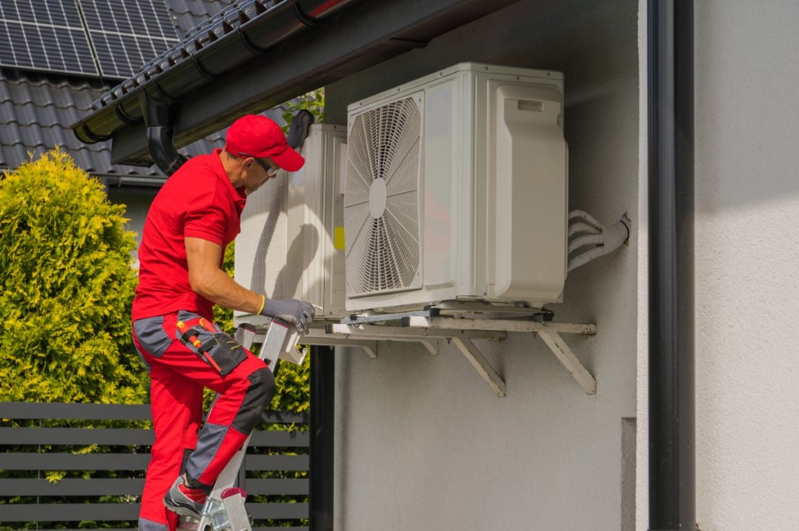 Technician performing installation