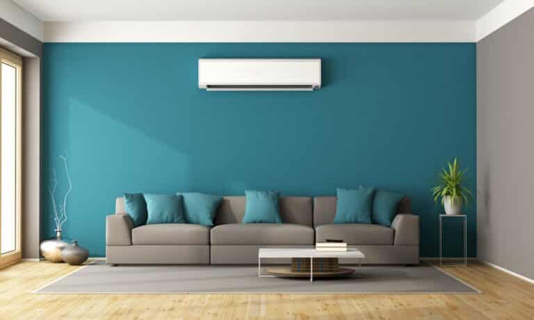 Modern living room with sofa and air conditioner - 3d rendering