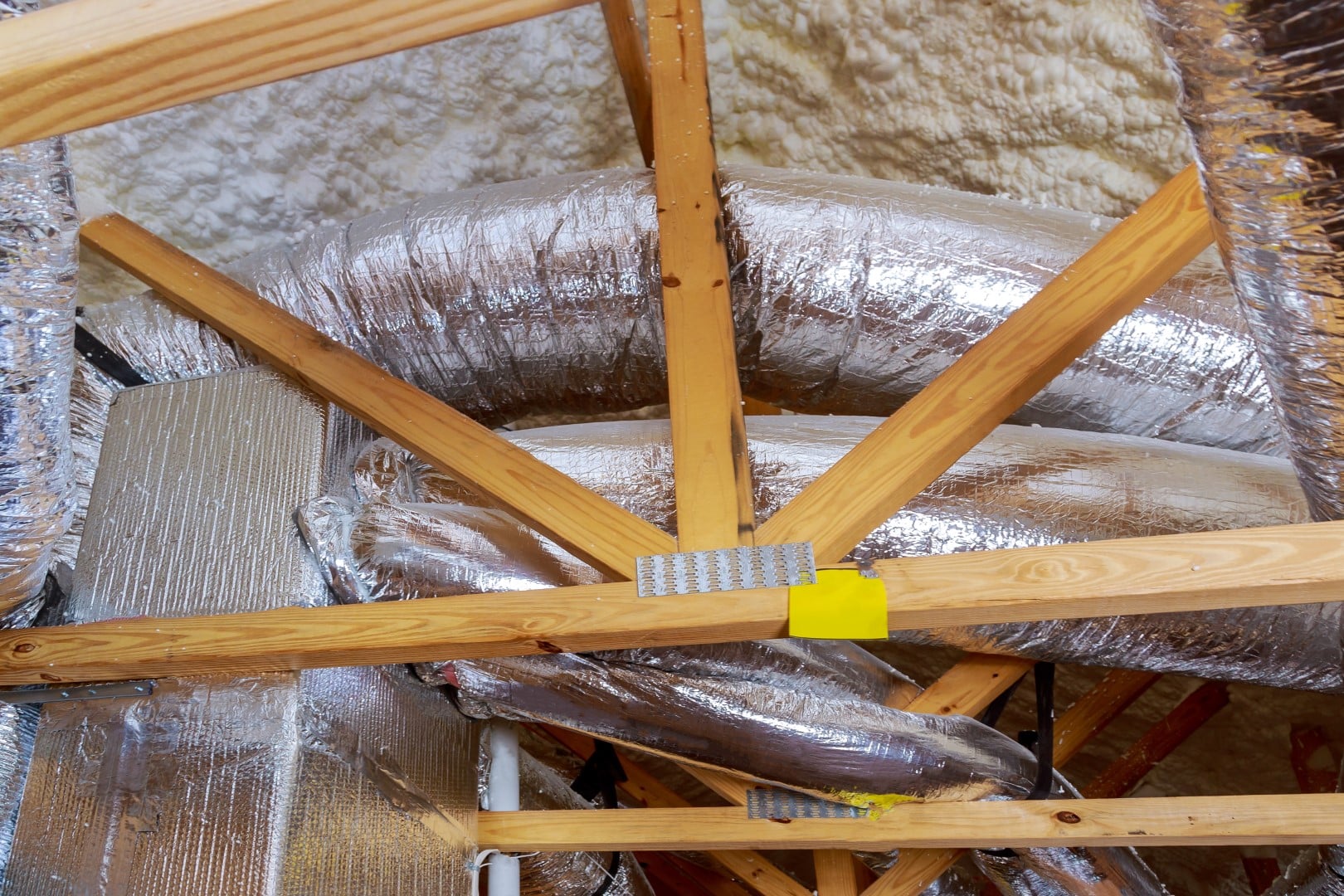 Insulated heating ducts running through a home