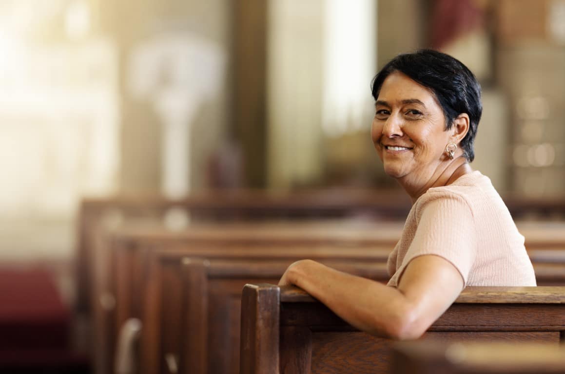 senior-woman-christian-and-happy-in-church-spiri-2023-11-27-04-52-34-utc1-Medium.jpg